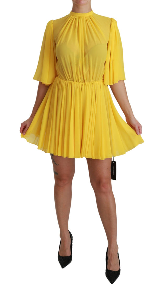 Vestido mini plisado de seda en forma de A de Dolce & Gabbana en amarillo brillante