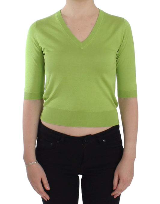 Jersey de cuello en V de lana verde esmeralda de Dolce & Gabbana