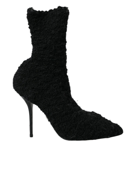 Zapatos negros con tacón de aguja y botas de media caña de Dolce & Gabbana