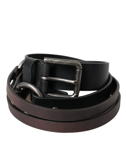 Cinturón de piel marrón y negra con hebilla de metal plateado de Dolce & Gabbana