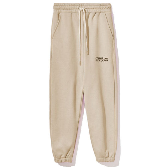Comme Des Fuckdown Vaqueros y pantalón de algodón beige