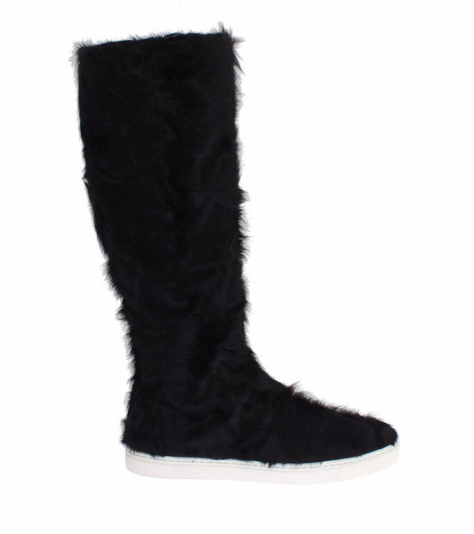 Botas planas elegantes de piel de color negro de Dolce & Gabbana