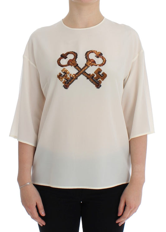 Blusa de seda con lentejuelas color marfil de Dolce & Gabbana