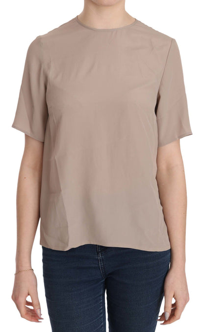 Blusa elegante de cuello redondo en mezcla de seda beige de Dolce &amp; Gabbana