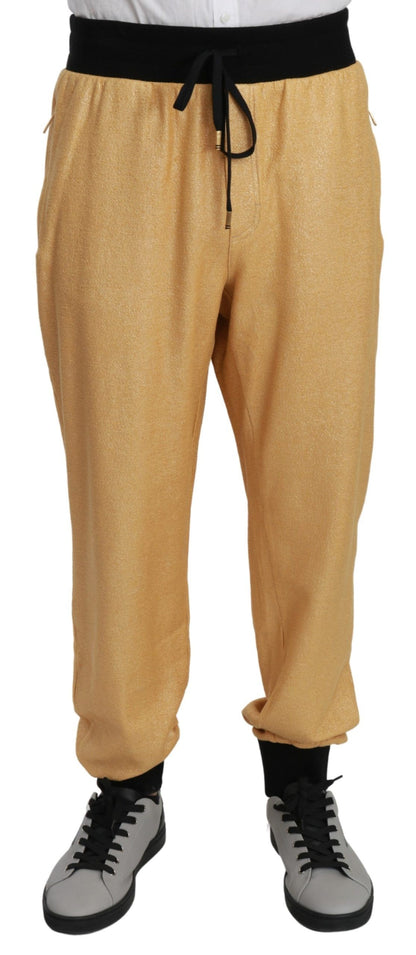 Pantalones deportivos elegantes con motivo dorado de Dolce &amp; Gabbana