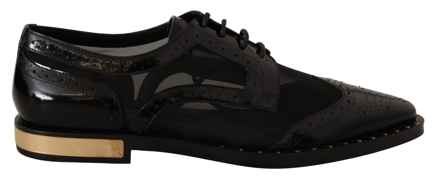 Elegantes zapatos Oxford negros con cordones y ribete dorado de Dolce &amp; Gabbana