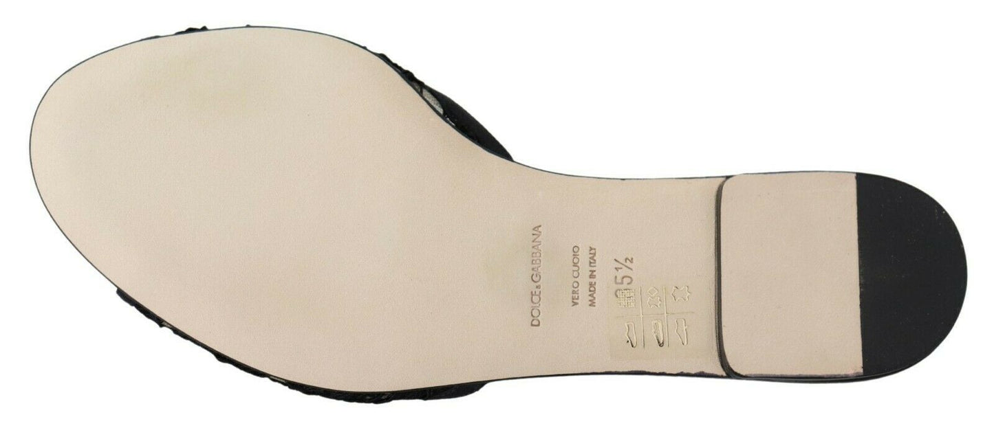 Elegantes mules de encaje negro con detalle de flor joya de Dolce &amp; Gabbana