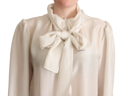 Blusa elegante de seda gris claro con cuello Ascot de Dolce &amp; Gabbana