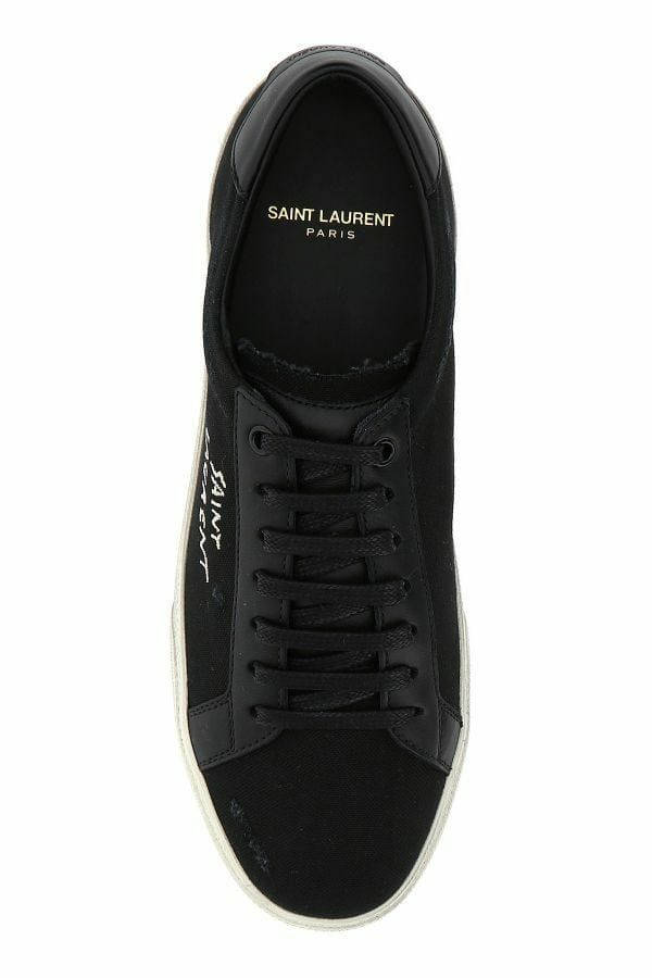 Zapatillas bajas elegantes de lona y piel negras de Saint Laurent