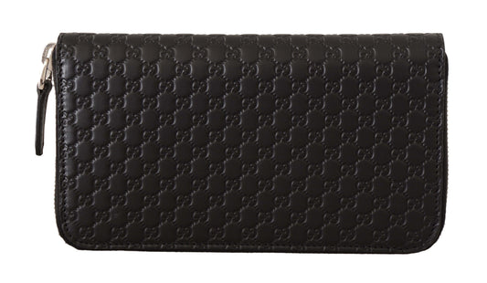 Cartera elegante de piel negra con cremallera de Gucci