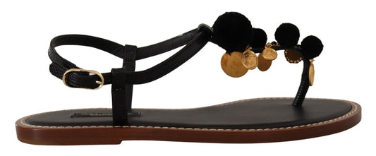 Zapatos planos elegantes de piel con tiras en el tobillo y detalles dorados de Dolce & Gabbana