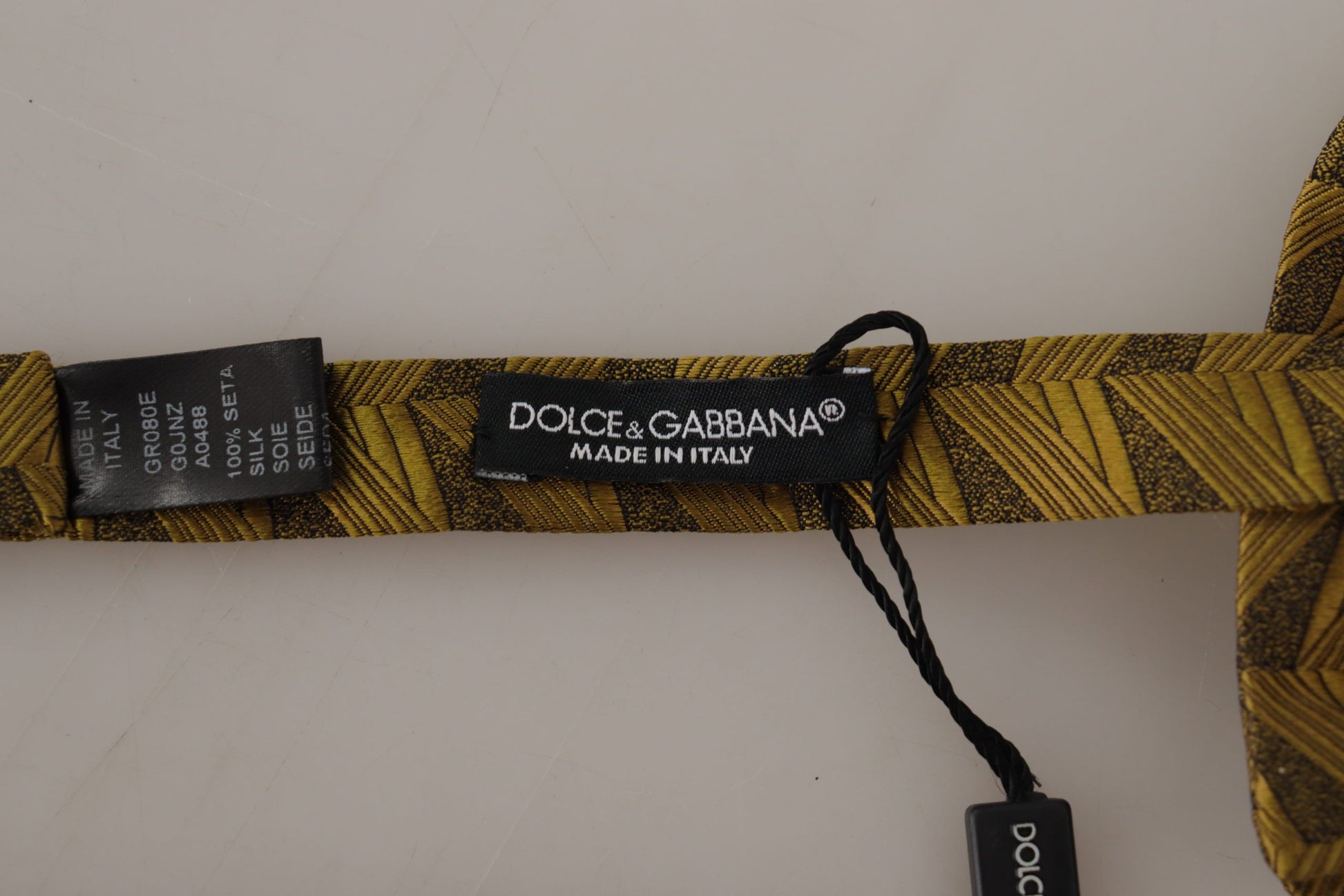 Pajarita elegante de seda dorada de Dolce &amp; Gabbana