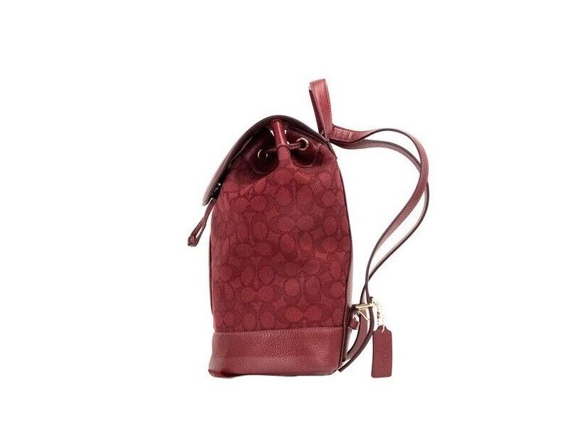 Mochila de lona con parche de logotipo en jacquard y firma de manzana roja Dempsey de COACH