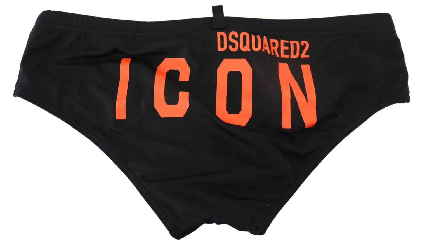 Bañador tipo slip elegante de color negro con logotipo naranja de Dsquared²