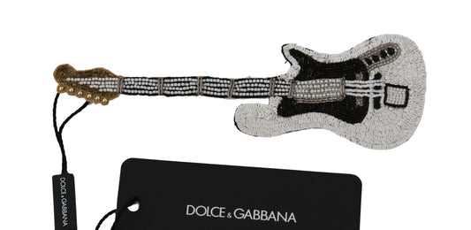 Broche con forma de guitarra y lentejuelas doradas de Dolce &amp; Gabbana