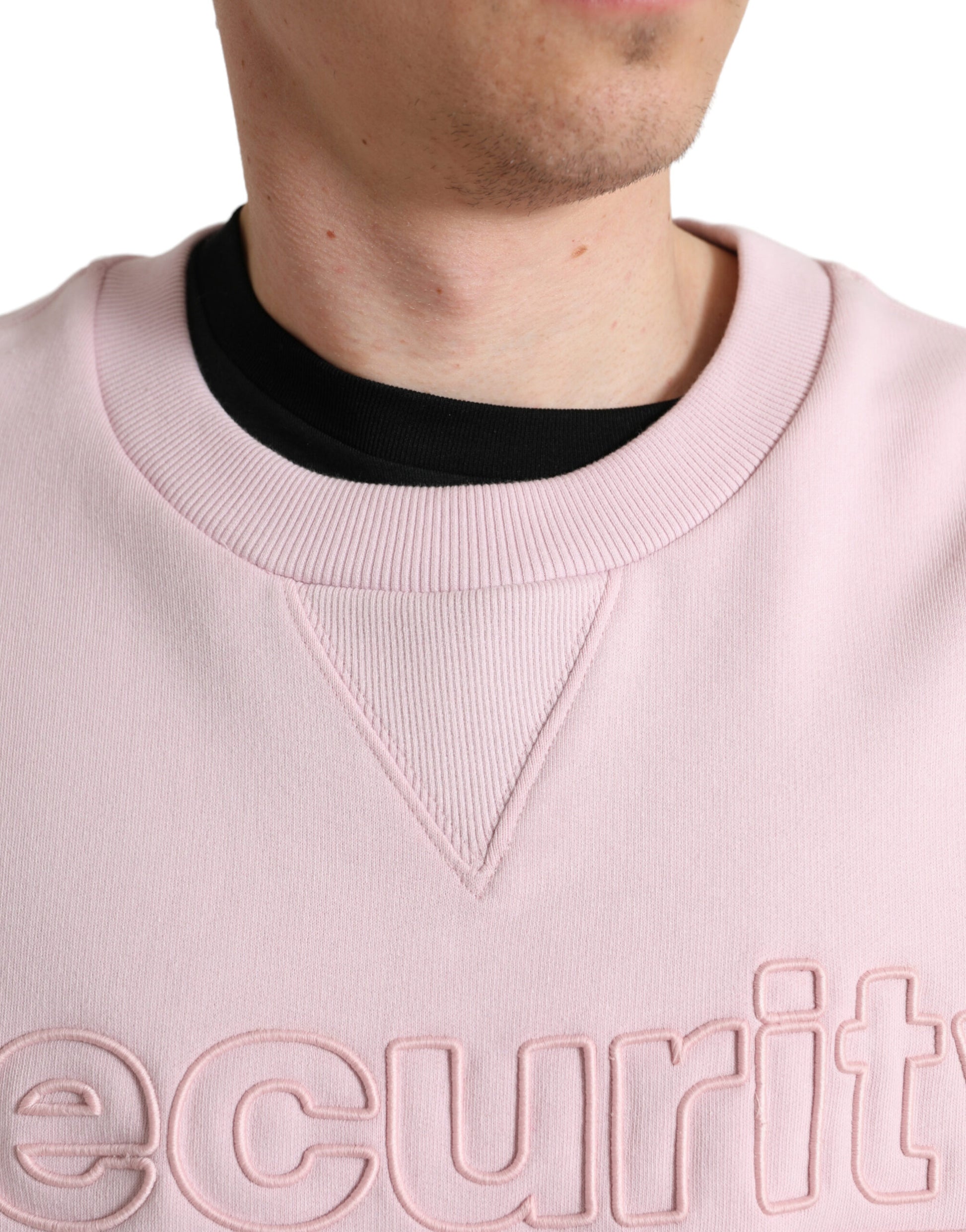 Suéter elegante con cuello redondo y logotipo en color rosa de Dolce &amp; Gabbana