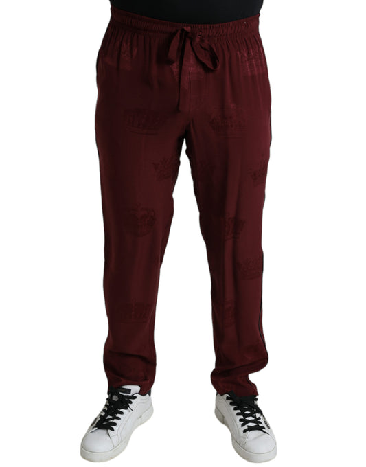 Pantalones de pijama elegantes de seda color granate con motivo de corona de Dolce & Gabbana