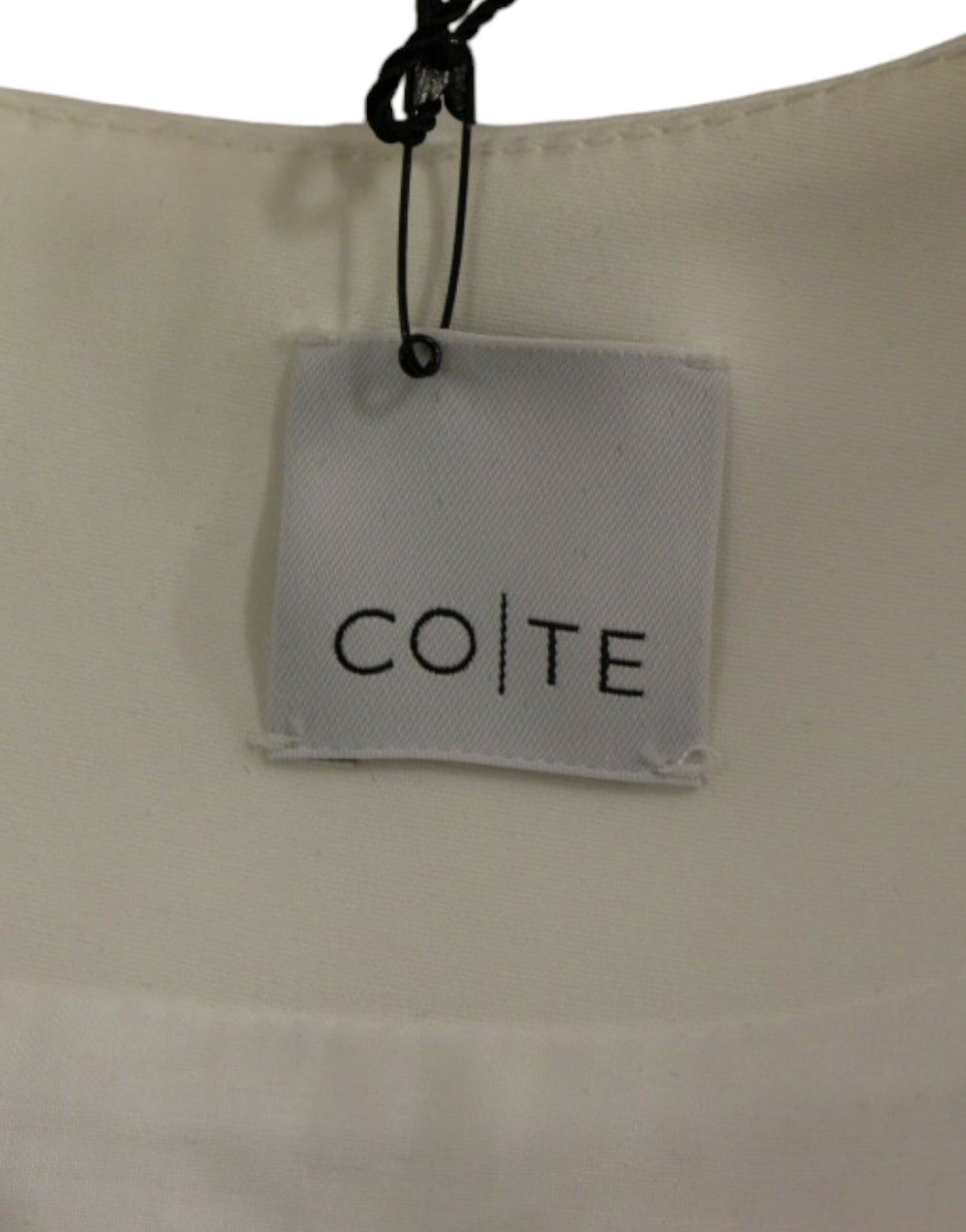 Vestido elegante estilo robot en blanco y rosa de CO|TE
