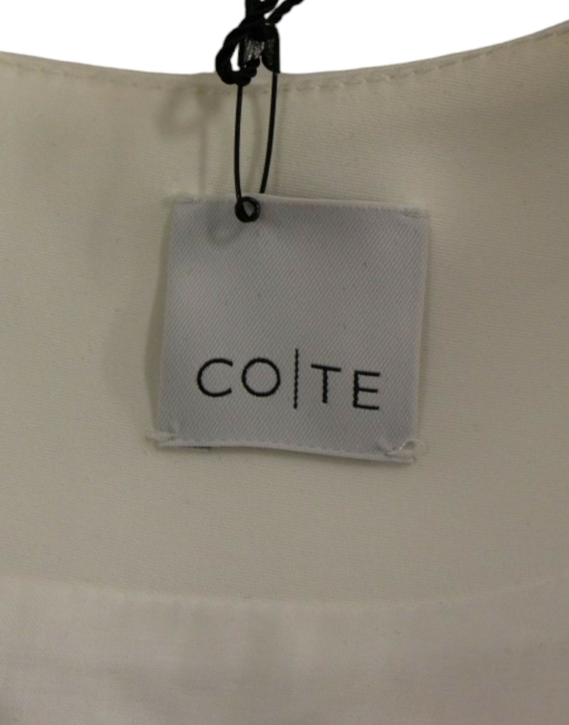 Vestido elegante estilo robot en blanco y rosa de CO|TE
