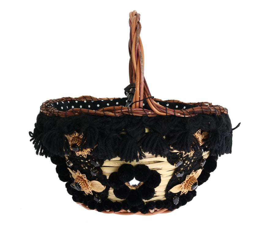 Bolso tipo cubo elegante de piel de serpiente en paja beige y negra de Dolce &amp; Gabbana