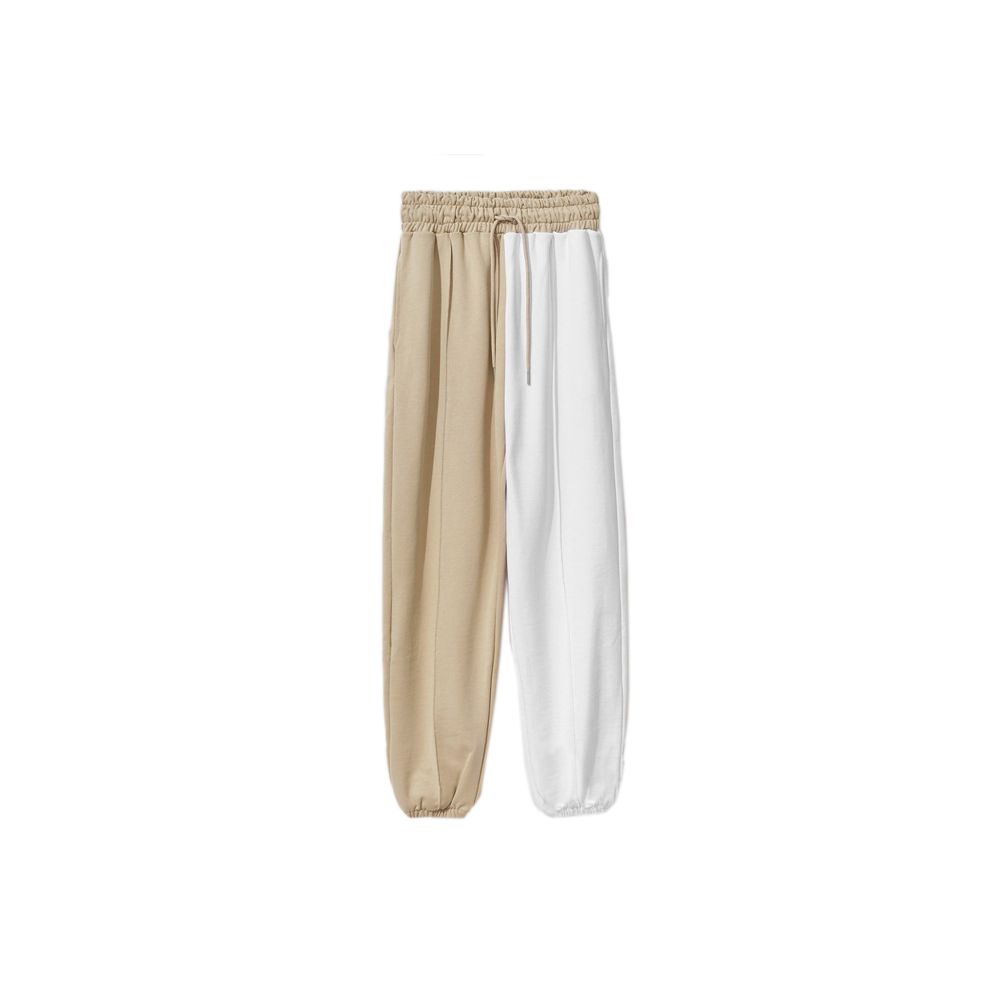 Pantalones deportivos bicolor con cordón y diseño elegante en beige de Comme Des Fuckdown