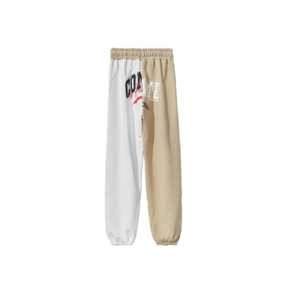 Pantalones deportivos bicolor con cordón y diseño elegante en beige de Comme Des Fuckdown