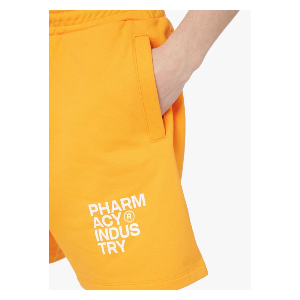 Pantalones elegantes de algodón color naranja con detalle de logotipo para la industria farmacéutica