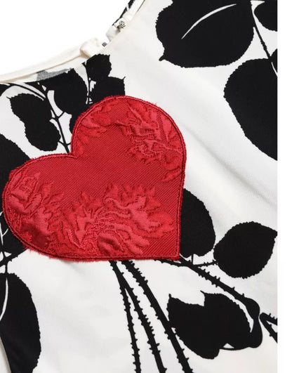 Camiseta sin mangas con corazón bordado y estampado de rosas blancas de Dolce &amp; Gabbana