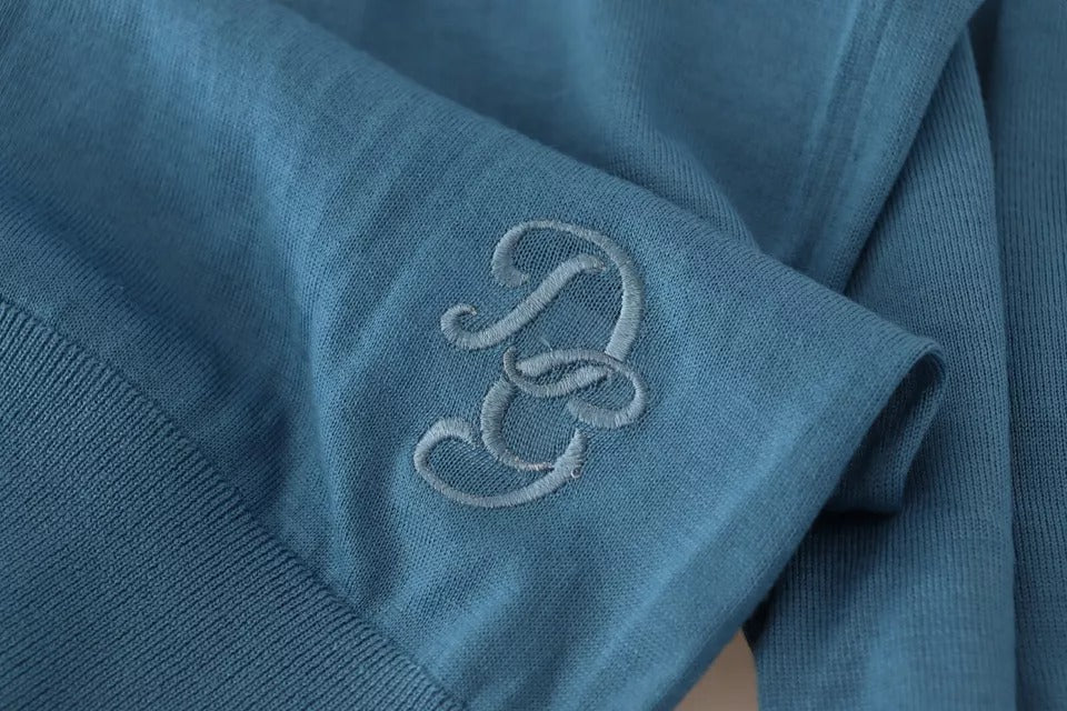 Suéter con cuello redondo y logotipo de cachemira azul de Dolce &amp; Gabbana