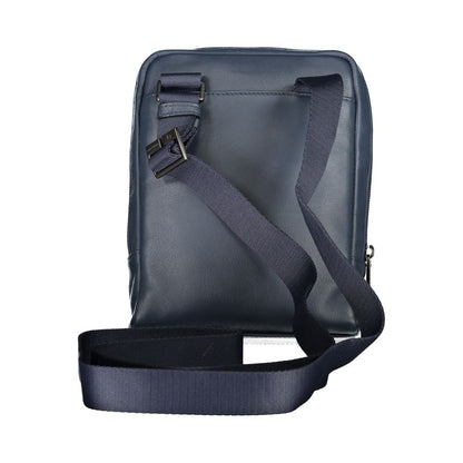 Elegante bolso de hombro de cuero azul con detalles en contraste