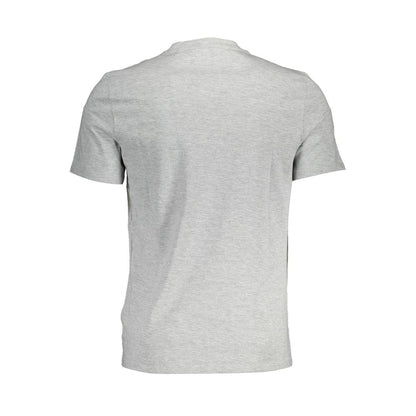 Camiseta elegante con cuello redondo y logotipo de Guess Jeans en color gris