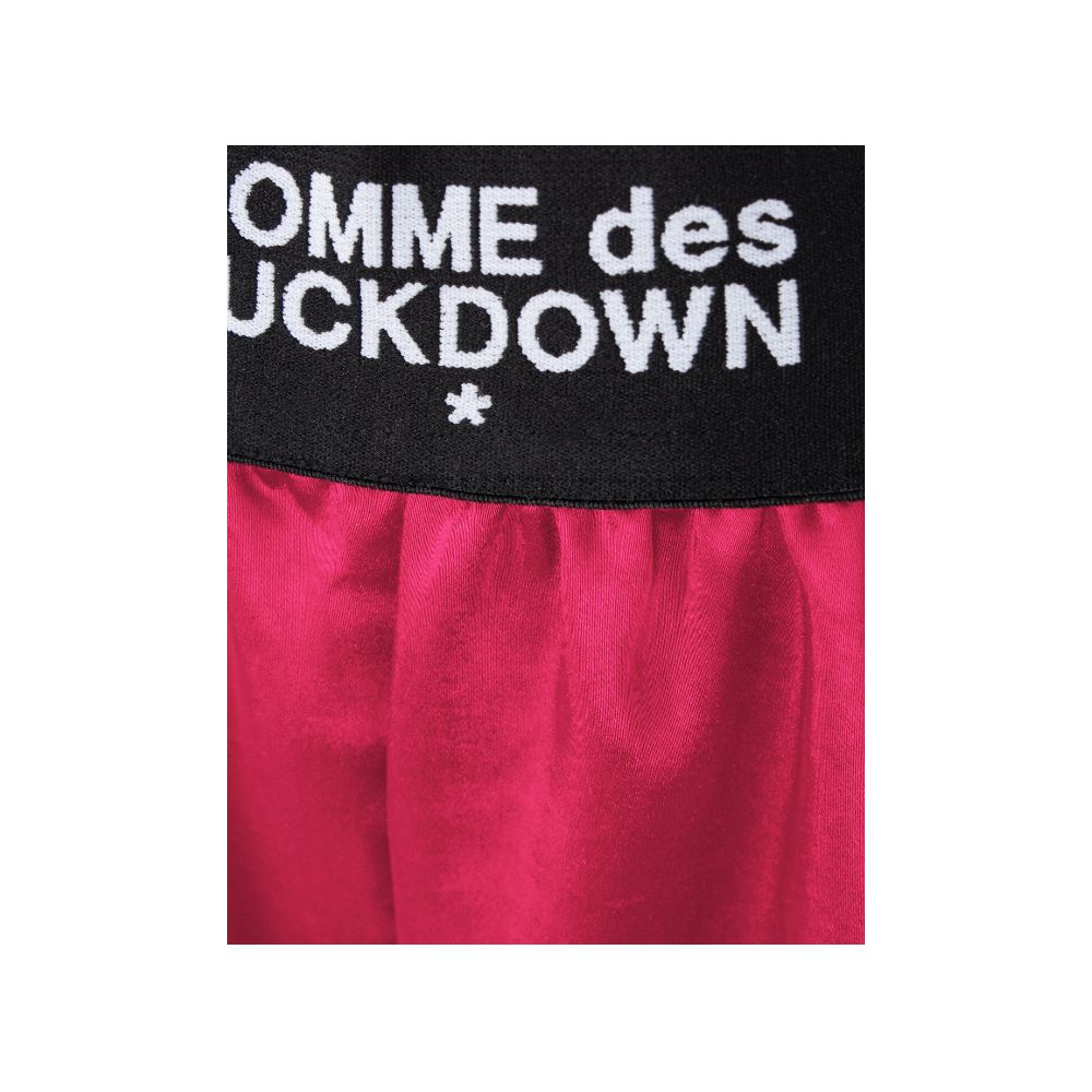 Pantalón corto de poliéster fucsia Comme Des Fuckdown