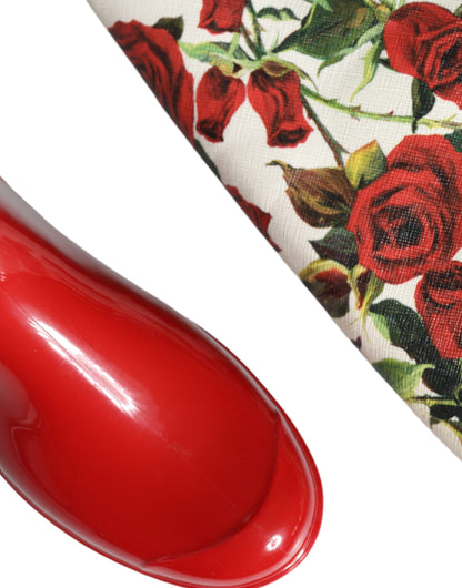 Botas planas hasta la rodilla de goma con estampado floral rojo de Dolce &amp; Gabbana