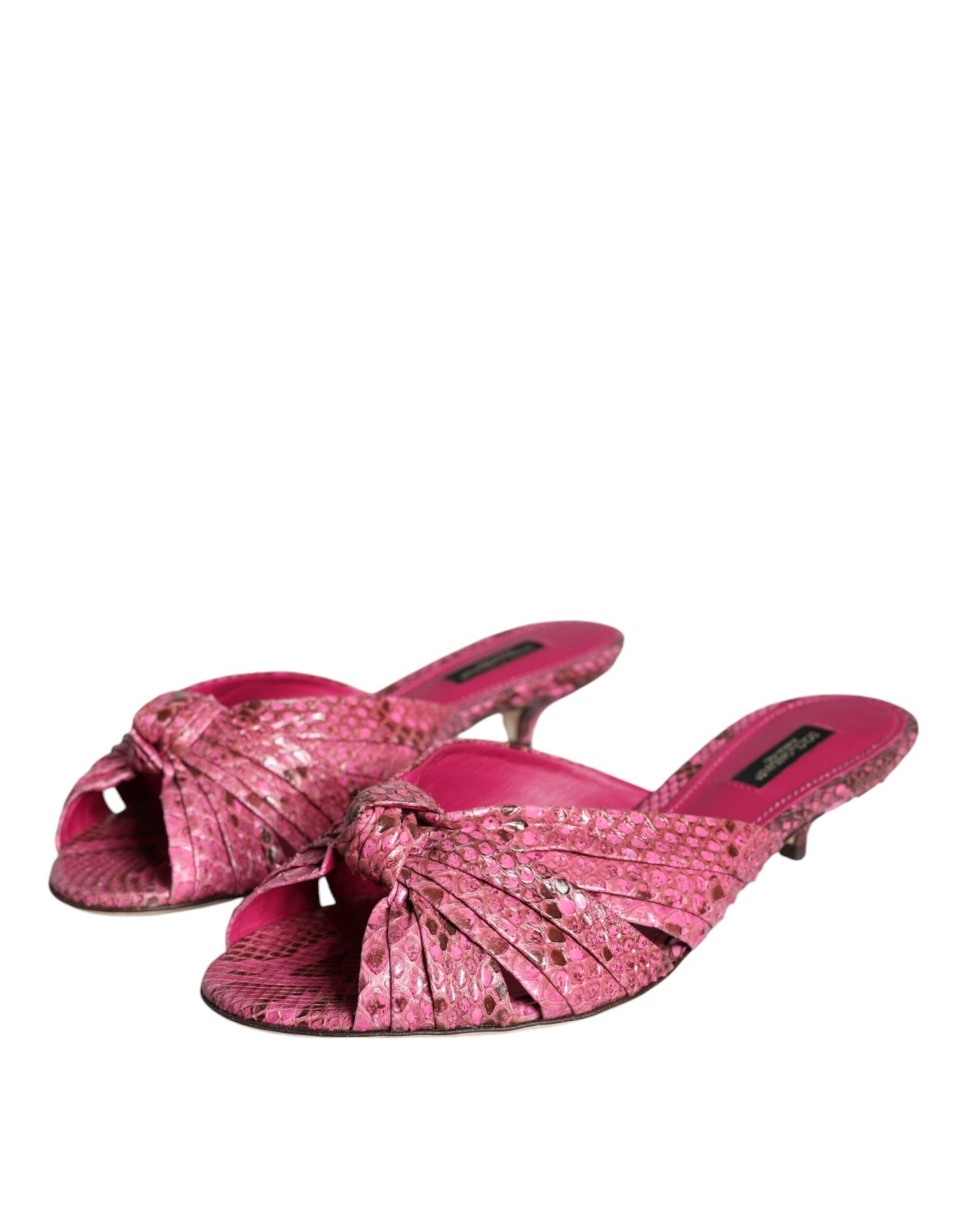 Zapatos tipo chanclas con tacón bajo y piel de pitón rosa de Dolce &amp; Gabbana