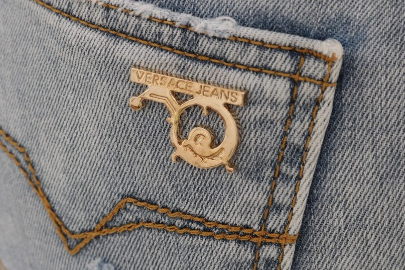 Vaqueros ajustados con rotos en azul claro de Versace Jeans Chic