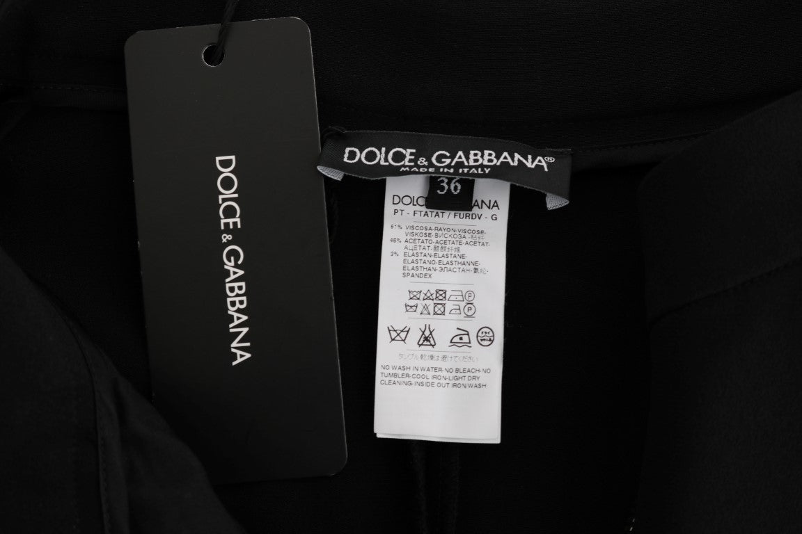 Pantalones capri negros elegantes con rayas laterales rosas de Dolce &amp; Gabbana