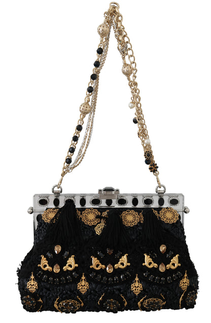 Clutch de noche con cristales barrocos dorados y borlas negras de Dolce &amp; Gabbana