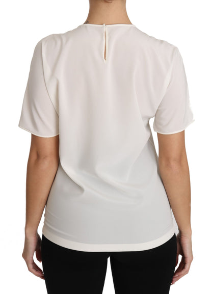 Blusa elegante de seda con cuello redondo y apliques de Dolce &amp; Gabbana