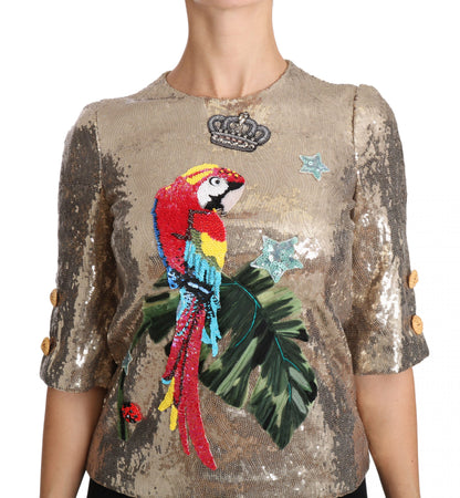 Blusa de cuello redondo con motivo de loro dorado y cristales de Dolce &amp; Gabbana