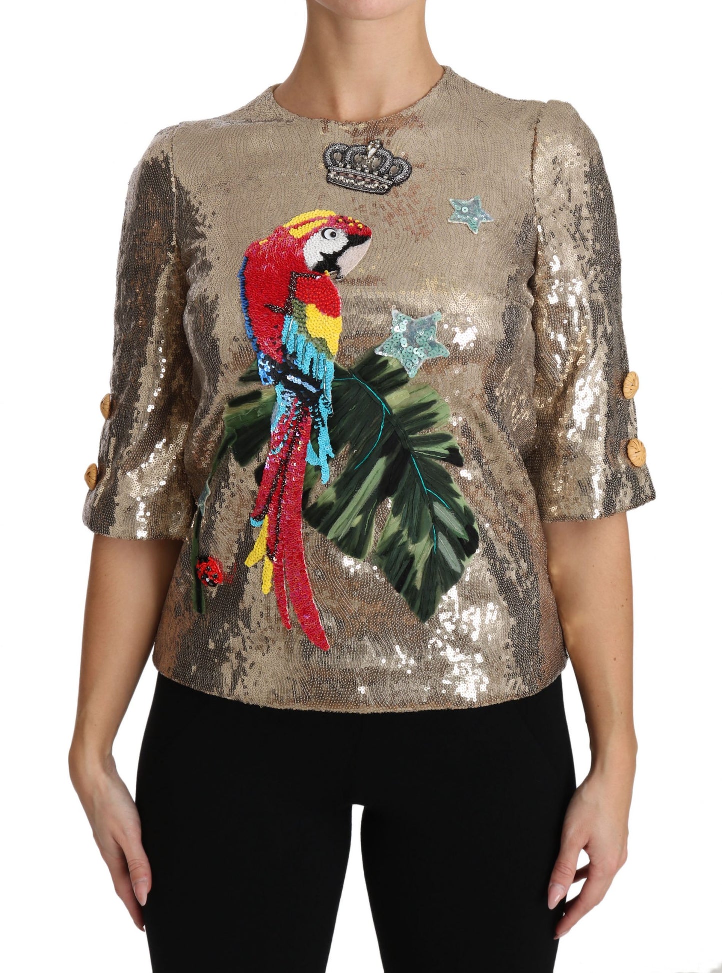 Blusa de cuello redondo con motivo de loro dorado y cristales de Dolce &amp; Gabbana