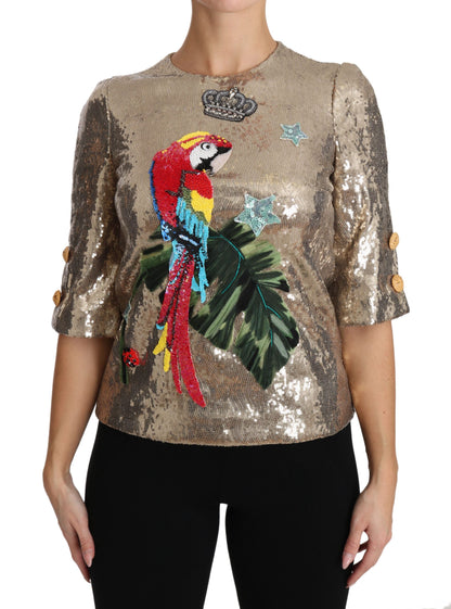 Blusa de cuello redondo con motivo de loro dorado y cristales de Dolce &amp; Gabbana