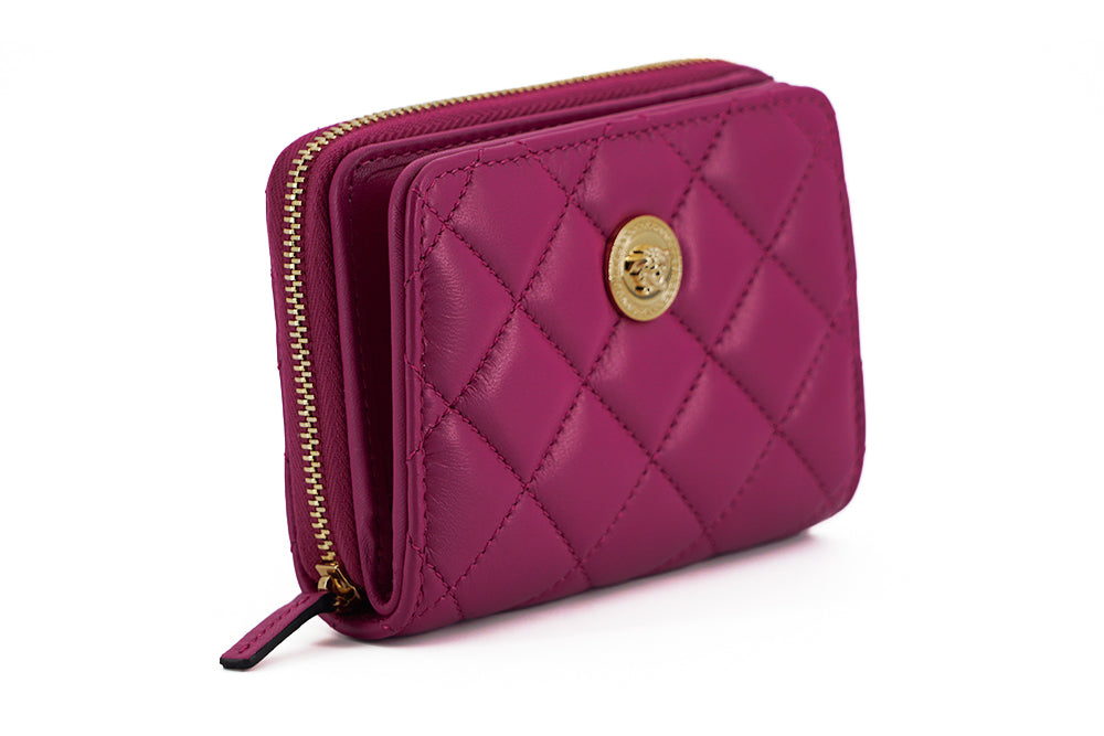 Cartera elegante de piel acolchada en color morado